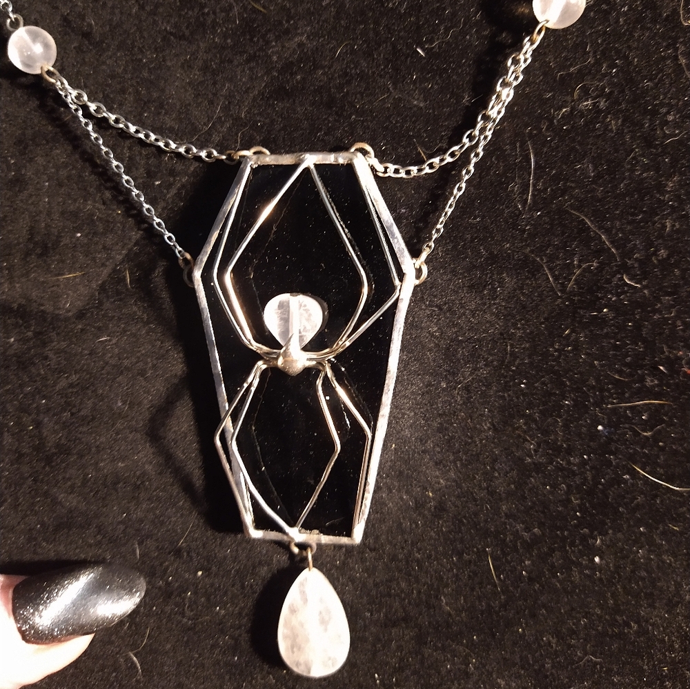 Stained glass spider coffin necklace